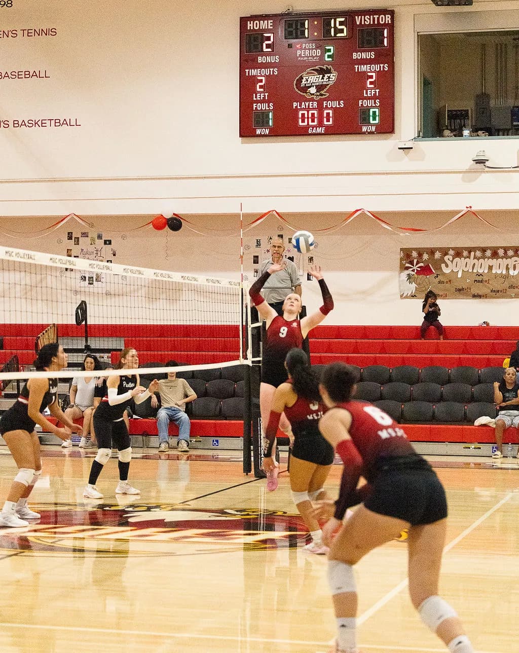 Mt. San Jacinto College setter Dini Schultz (#9) sets the ball for the Eagles' offense during home volleyball action against Chaffey College.
