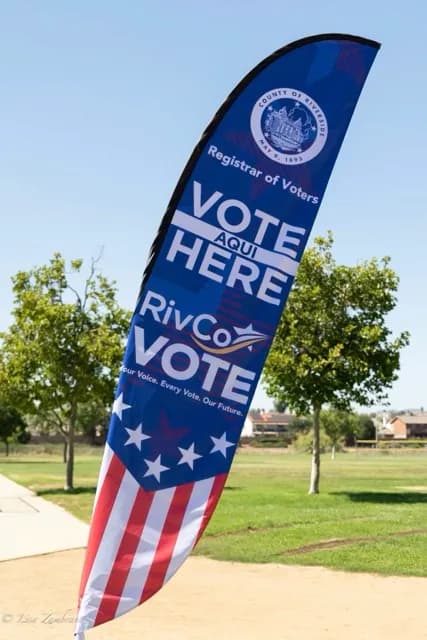 A Riverside County Vote Here Sign election funding budget. A Riverside County Vote Here Sign outside a polling center. Photo by Lisa Zambrano