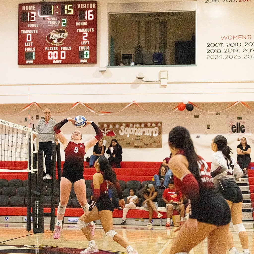 Mt. San Jacinto College volleyball competes against Chaffey College during home match action, featuring play setting from Dini Schultz (#9), net attacks by Daija Malcolm (#12) and Shelsy Delgado (#3), and defensive leadership from Sophia Castro (#14).