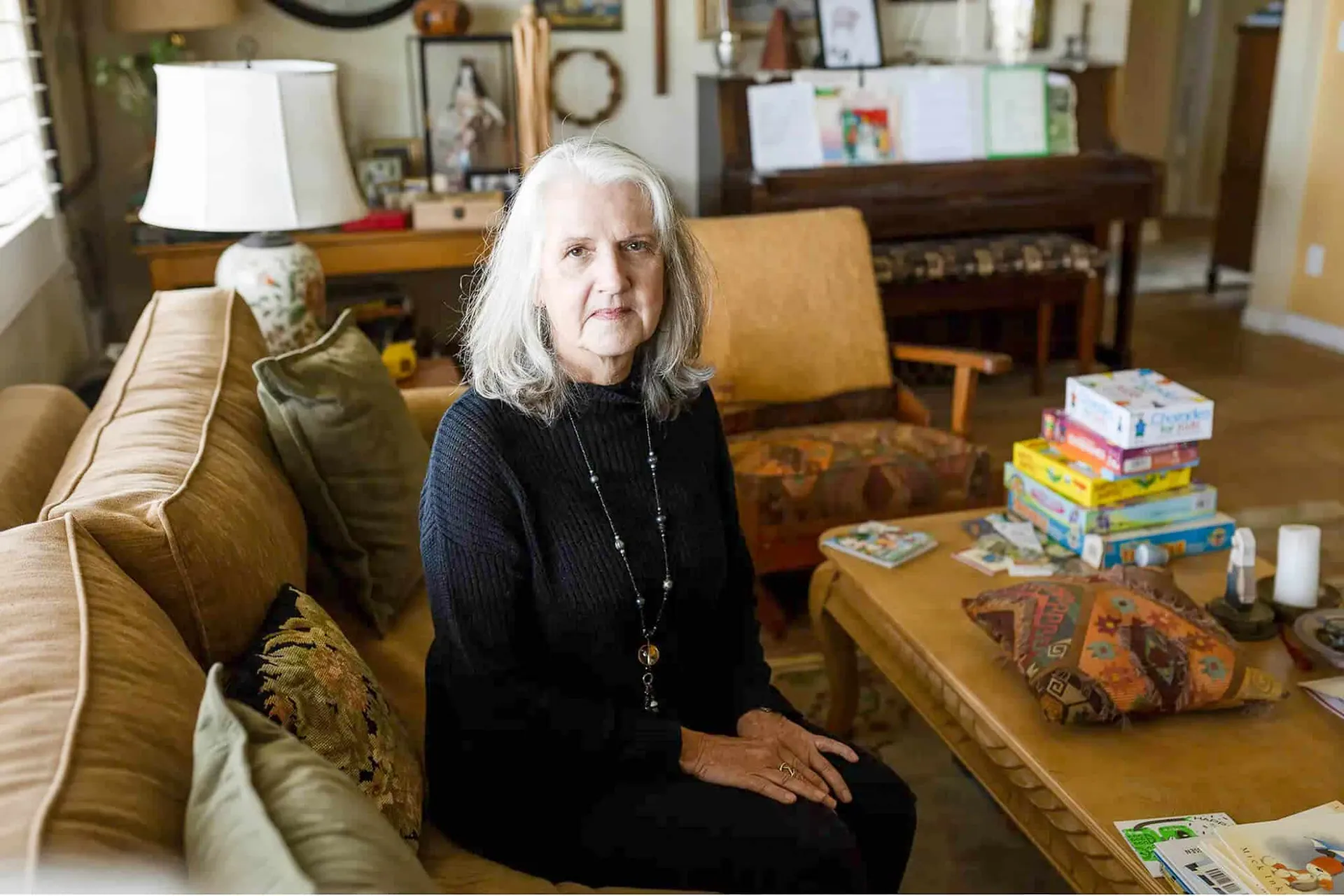 Child Welfare. Patricia Baca inside her home in Vista. Baca, who adopted her late son’s children, has unsuccessfully tried to get their benefits returned.