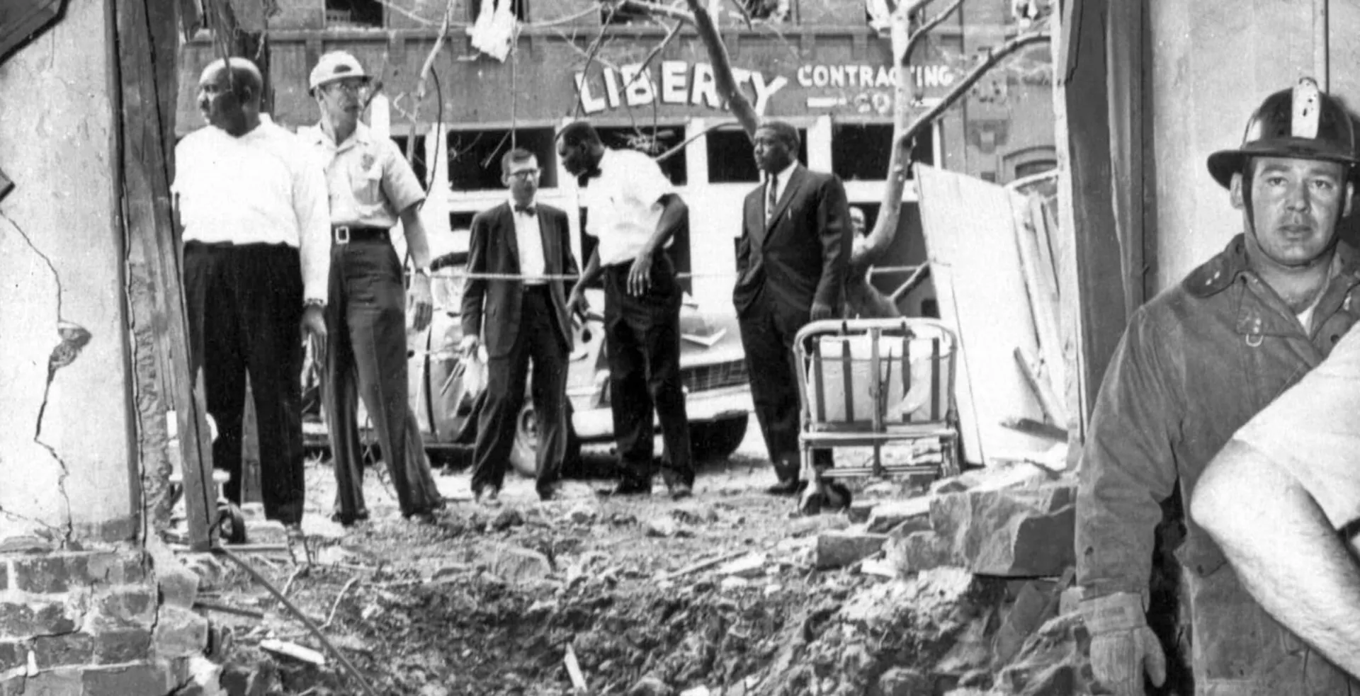 September 15. The crater and other damage caused by the bombing of the Sixteenth Street Baptist Church, which killed four African American girls.