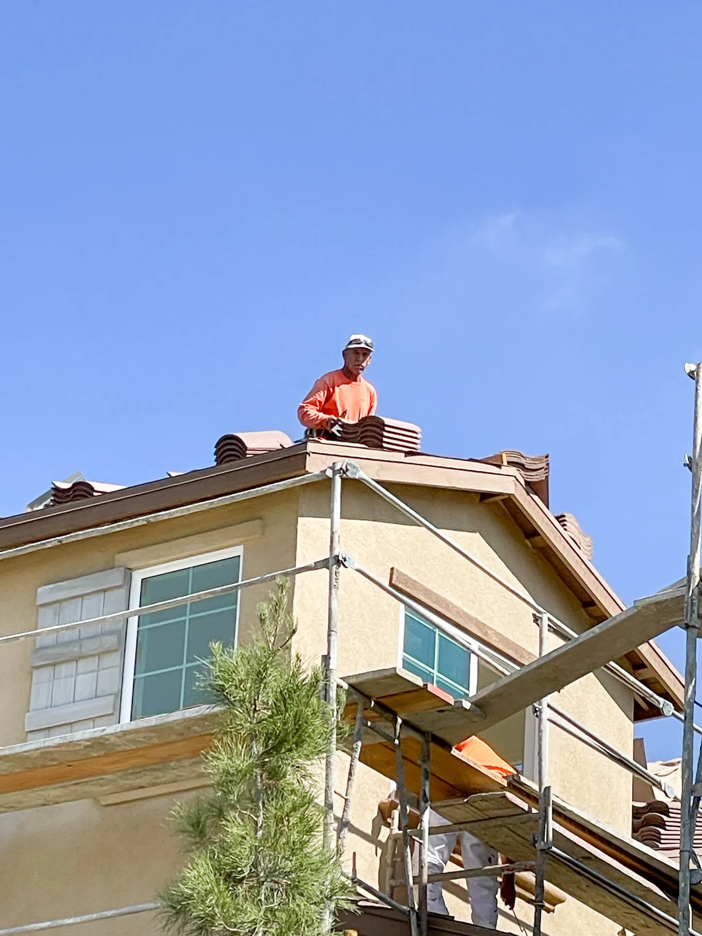 Menifee Grows Up. Construction workers at a residential complex on Antelope Road south of Mt. San Jacinto College. Credit: Photo by Don Ray