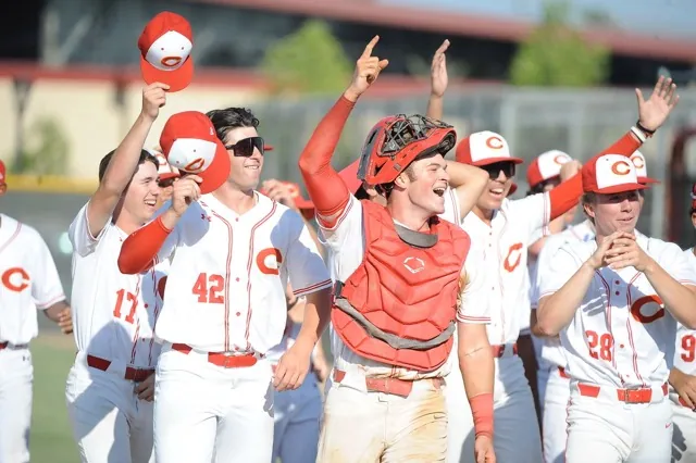Corona baseball players salute their fans after the Panthers defeated visiting Huntington Beach. The Panthers face Harvard Westlake in the CIFSS D1 title game on Saturday. Corona won, 6-4.