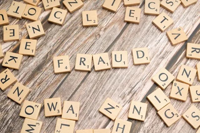 Embezzlement Scheme. Fraud Scheme. Nuevo. Photo by Markus Winkler: https://www.pexels.com/photo/the-word-fraud-spelled-out-in-scrabble-letters-19835552/