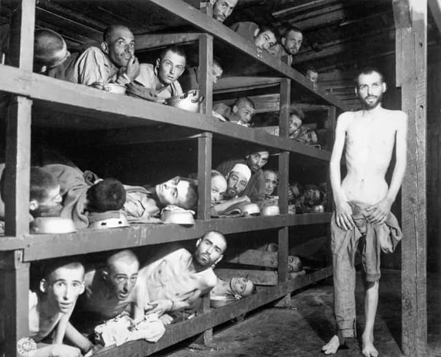 April 11. Slave laborers at Buchenwald after liberation in 1945. Elie Wiesel is seen in the second row, seventh from left. Credit: Private H. Miller. (Army)