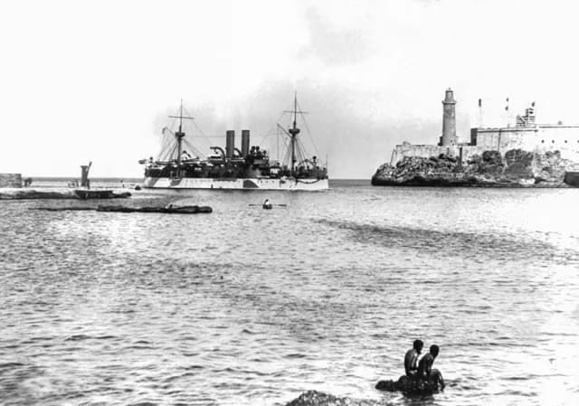 April 25. The battleship Maine entering Havana Bay. It later sank due to an explosion killing 266 servicemen. It was disputed whether or not Spain was responsible.