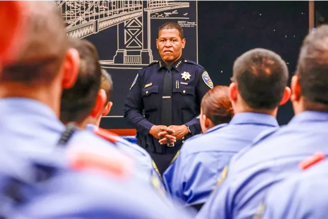 Education Requirements for Police Officers. Then-San Francisco Police Chief William Scott and Mayor London Breed, not shown, address recruits in the Police Academy in San Francisco on Oct. 2, 2024. Credit: Photo by Jessica Christian, San Francisco Chronicle via AP