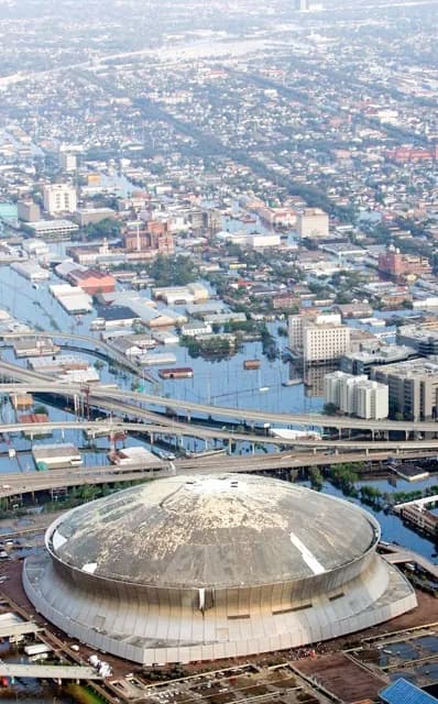 August 29. FILE - In this Aug. 30, 2005, file photo, The Louisiana Superdome is shown in this aerial view, which was damaged by Hurricane Katrina, surrounded by floodwaters, in New Orleans. Freakish weather, from this weekends October snowstorm to the long-lasting drought in the US Southwest, is striking more often. And global warming should make future weather even weirder, a special international report says. (AP Photo/David J. Phillip, File)