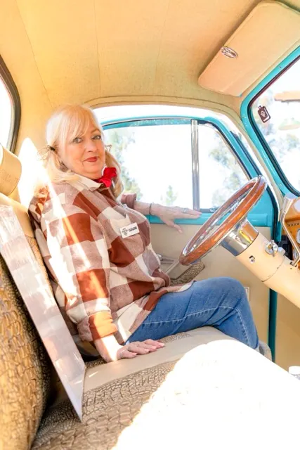 Motte Museum. Linda “Goldie” Meredith bought her blue 55’ Studebaker truck 5 years ago and turned it into her “Chick Truck.” She added thin pink and white hearts above the review, driver, and passenger windows — with a bright pink lipstick kiss placed right behind the driver's seat, “I added that sign,” Goldie said. “When I plug it in, it lights up neon pink.”