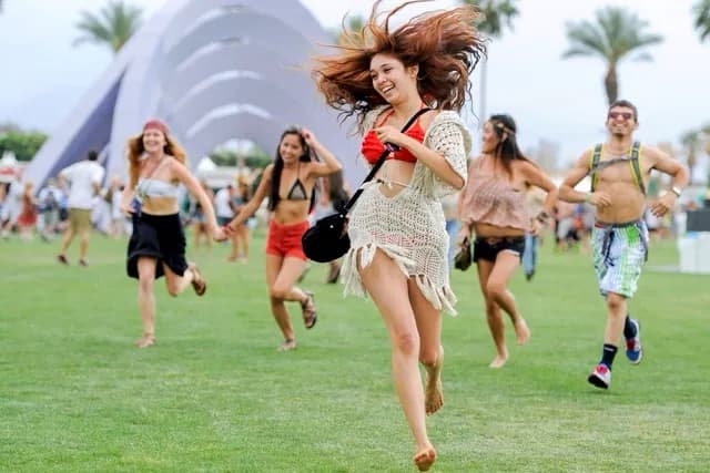 Music Festival Season. Festivalgoers run toward the main stage at the Coachella Valley Music and Arts Festival in Indio, Calif., on April 13, 2012. Credit: AP Photo/Chris Pizzello
