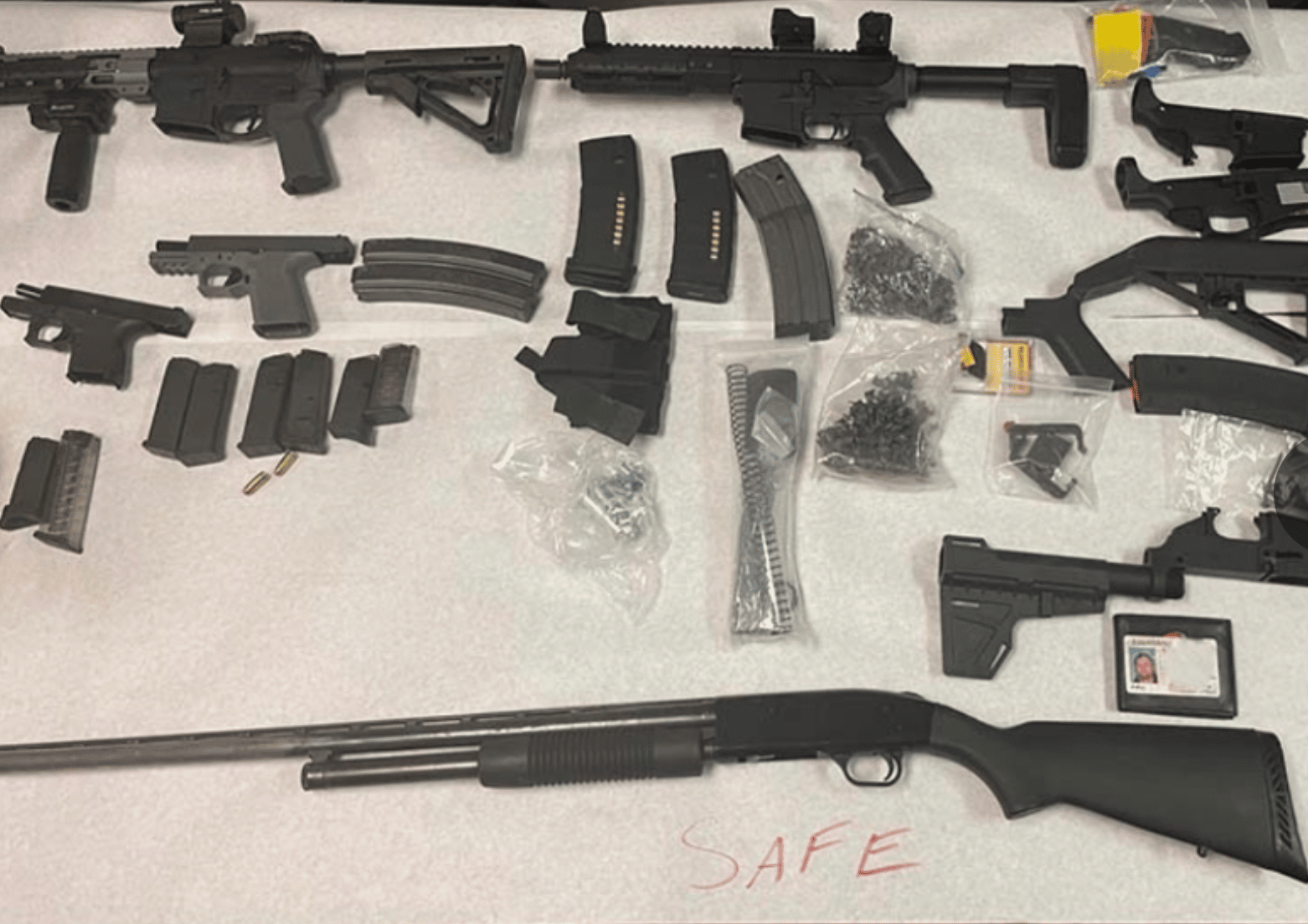 Weapons seized at the Apple Valley home of Steven Allen Schultz who pleaded guilty to threatening Eastvale co-workers in July. Credit Riverside County Sheriff