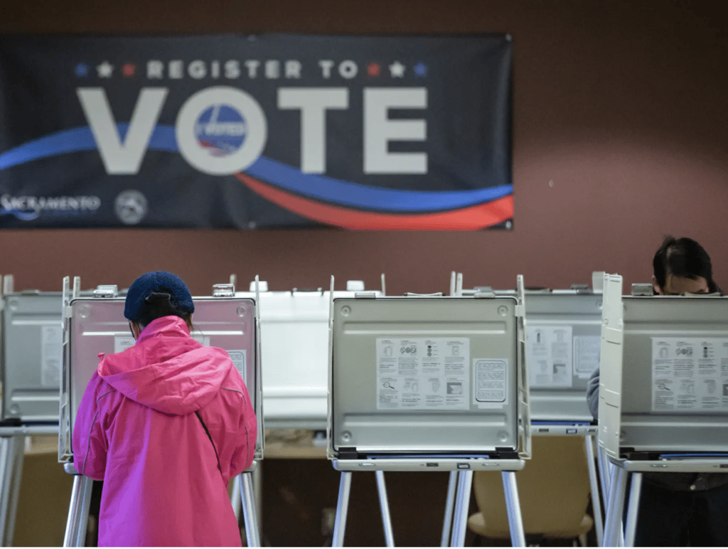 A person votes at a voting center