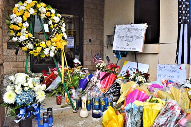 Candles, flowers, wreaths, and cards fill the entry walkway of the Riverside County Sheriff’s Jurupa Valley Substation in an outpouring of grief and citizen support for slain Riverside Sheriff’s Deputy Isaiah Cordero