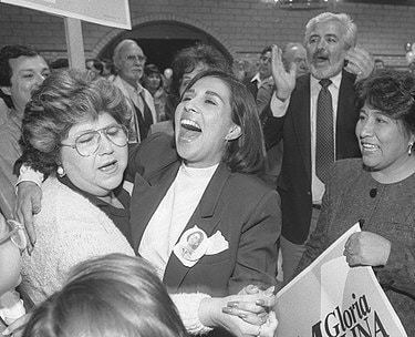 Molina celebrating her win in the City Council in 1987.