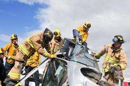 "Auto Ex" A total of 120 firefighters cut up 100 vehicles as they learn the latest techniques to extricate victims trapped in vehicles following a wreck. Photo or Photos by Jerry Soifer