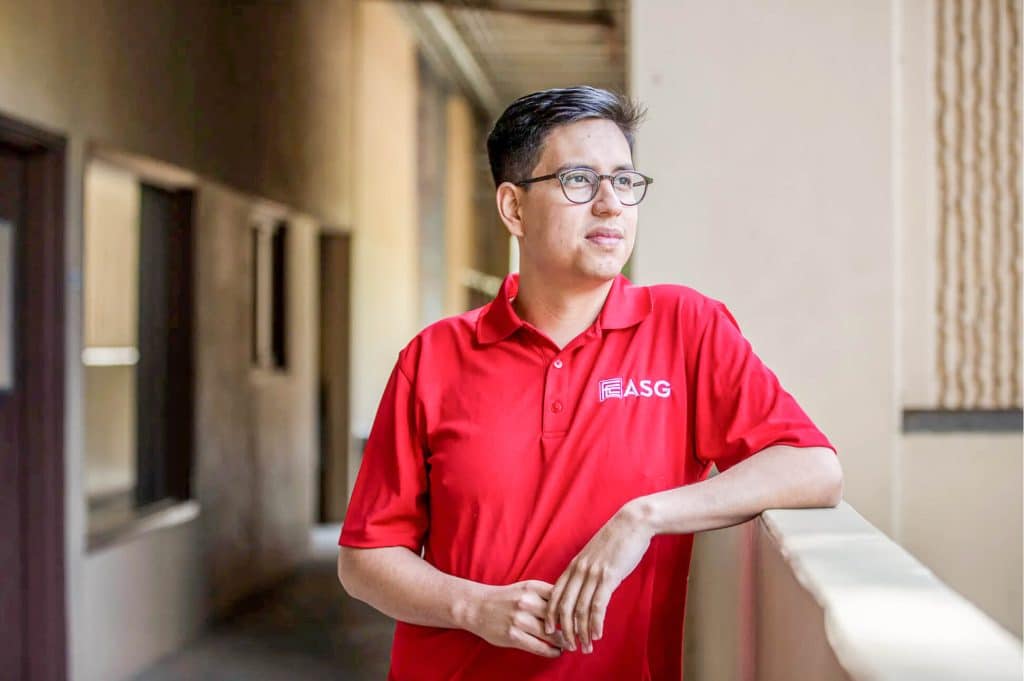Associated Student Government President, Mateo Vargas stands on campus of Fresno City College on May 5, 2023. Credit: Photo by Larry Valenzuela, CalMatters/CatchLight Local