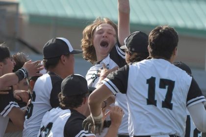 Santiago's Ethan Monroe reaches skyward to celebrate his walk off home run, ending Mater Dei’s season. Photo by Jerry Soifer