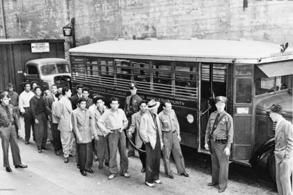 Zoot suit riots. Zoot suiters lined up outside Los Angeles jail en route to court after fight with sailors
