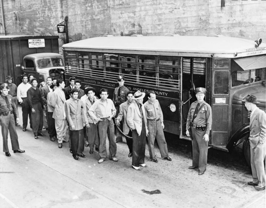 Zoot suit riots. Zoot suiters lined up outside Los Angeles jail en route to court after fight with sailors