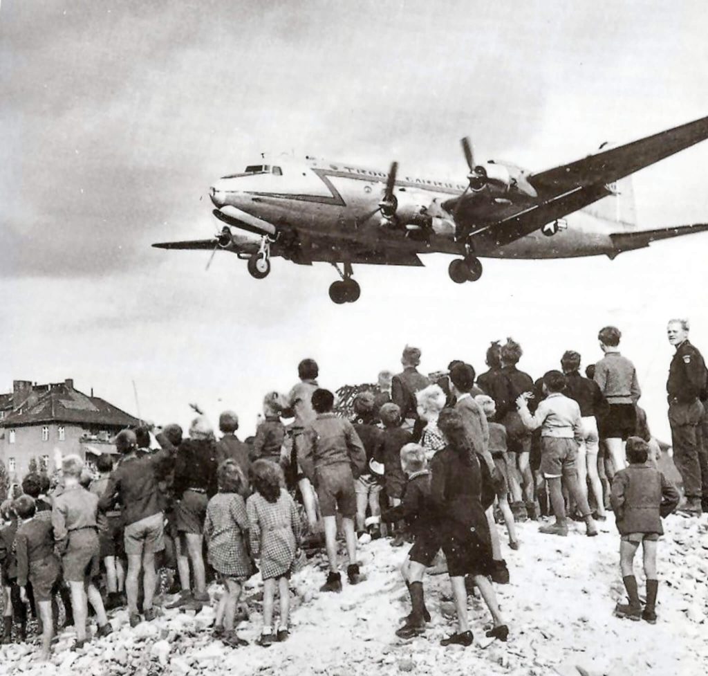 FRIDAY May 12, 2023 This Date in History Berliners watching a C-54 land at Berlin Tempelhof Airport, 1948. USAF