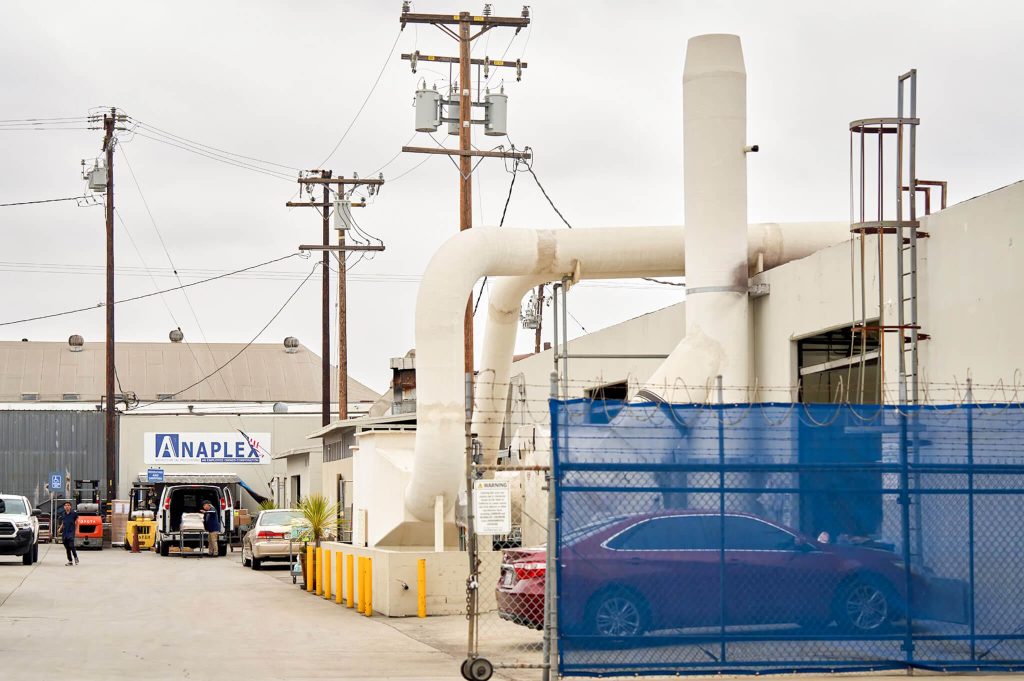 : Anaplex, a metal-plating company In Paramount, Los Angeles County, was shut down by air-quality officials in 2017 and 2018 because of hexavalent chromium emissions. Small amounts of hexavalent chromium, which comes from nearby metal-plating plants, were found in the air inside Lincoln Elementary classrooms in 2017 tests. Credit: Photo by Lauren Justice for Cal Matters
