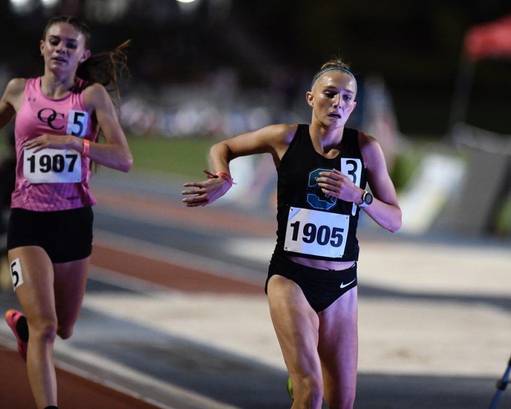 Blade Corona Santiago's Rylee Blade nears the finish of the 3200-meter run which she won in 10 minutes 2.19 seconds. Oaks Christian’s Payton Godsey was second in 10:02.63. Photo by Jerry Soifer