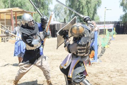 Koroneburg Renaissance Festival soldiers battle with swords Saturday on the next to last weekend of the event in Eastvale. Sword fighting and jousting with lances on horseback were two of many activities that recreated Renaissance history. Photo By Jerry Soifer