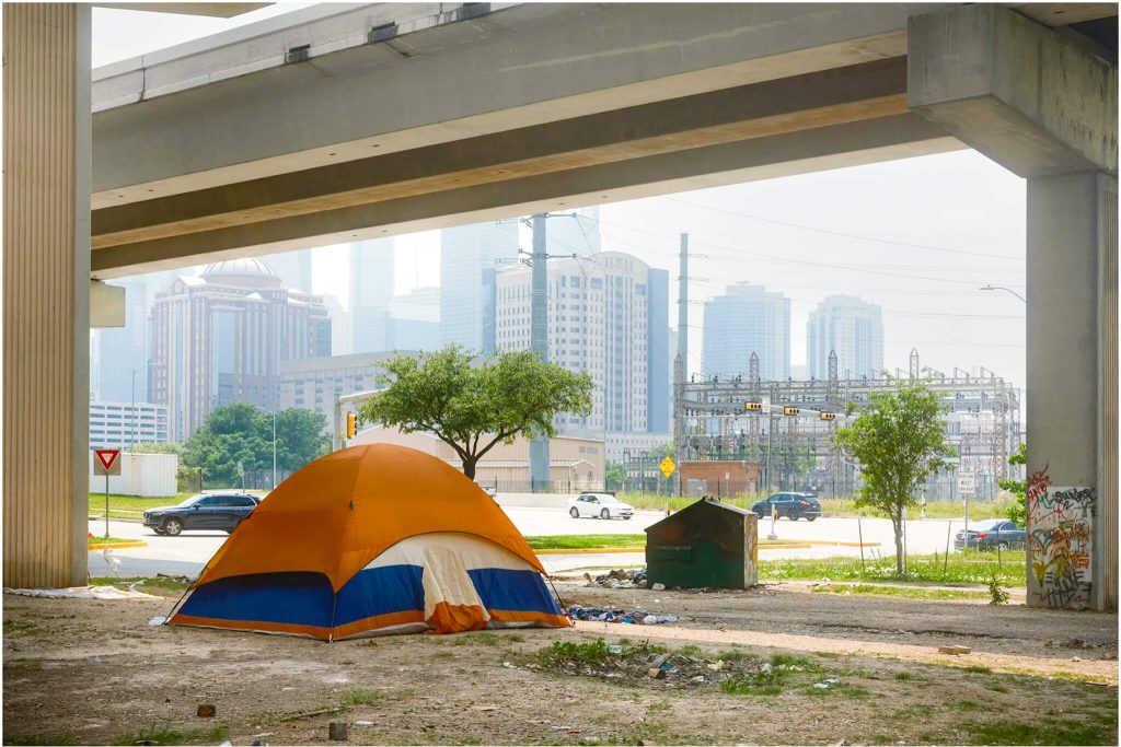 A homeless encampment under Interstate Highway 69 in downtown Houston on May 5, 2023. 
Credit: Photos by Jordan Vonderhaar for CalMatters.
