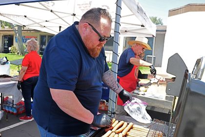 100 Veterans Honored in Corona Friday. Corona Mayor Tony Daddario, left, and retired firefighter and Vietnam veteran Tom Sherman cook the chow for more than 100 veterans who were honored at the Veterans Center in Corona Friday June 30.
