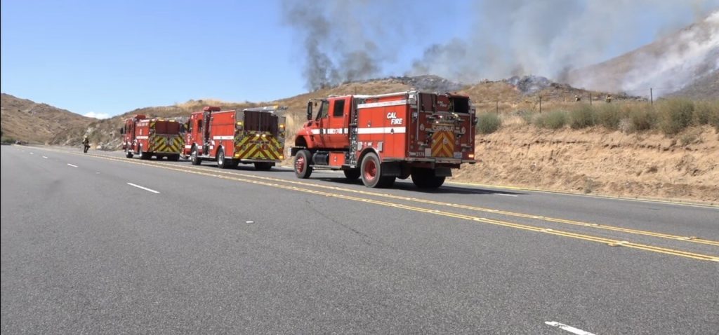 Blistering Heat Firefighters battle two vegetation infernos that merged into one in the Jurupa Hills on Wednesday.