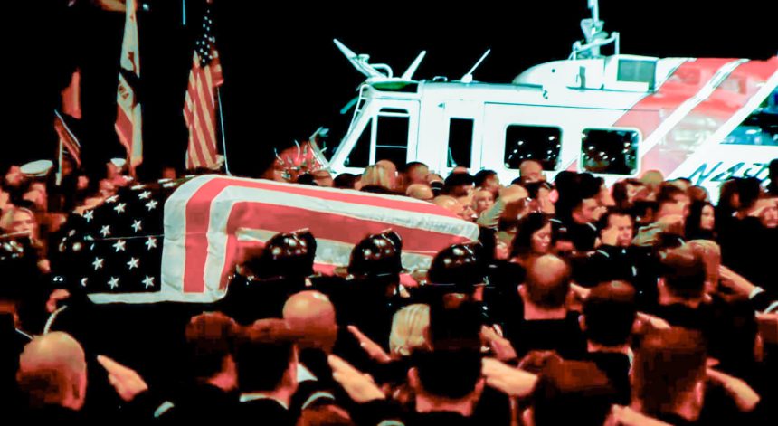 The casket of fallen Cal Fire Capt. Tim Rodriguez is carried into the Ontario Convention Center past a department helicopter, the department position and mission he so loved. Credit: Cal Fire Streaming Feed