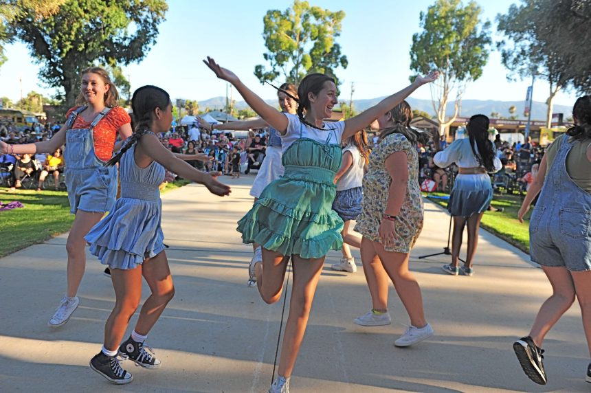Members of the Christian Arts Theater of Corona dance at the Summer Street Fair on the final date for Corona Summer Street Fair’s 2023. Photo by Jerry Soifer