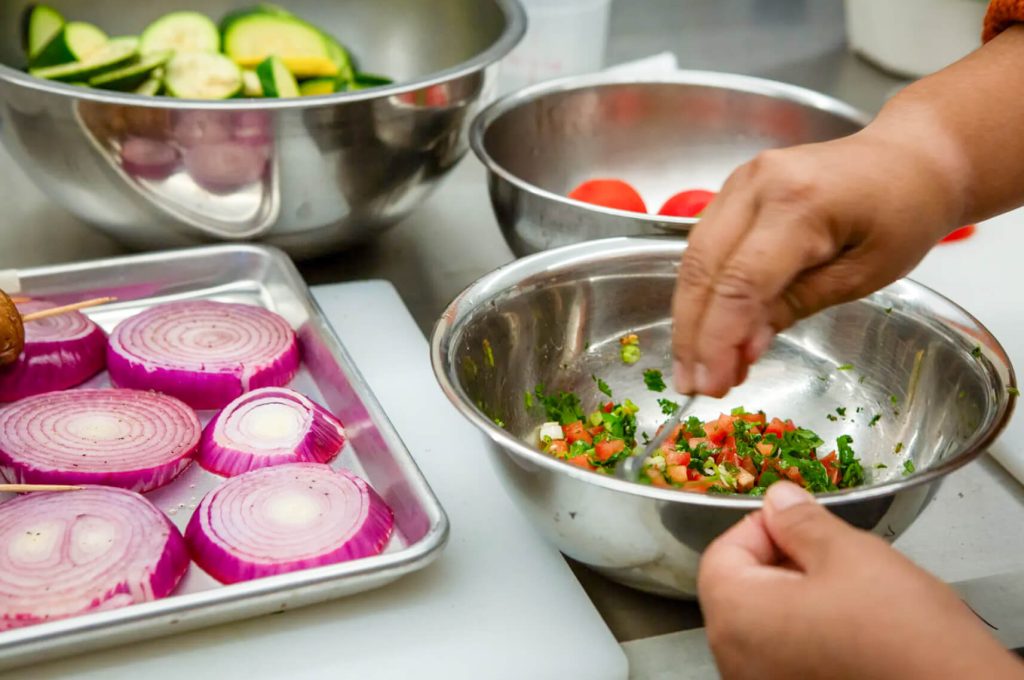 School Lunches. School food service workers train at the Culinary Institute of America as part of Farm to School, an initiative to provide healthier lunches in California schools, in Napa on Aug. 3, 2023. Photo by Semantha Norris, CalMatters