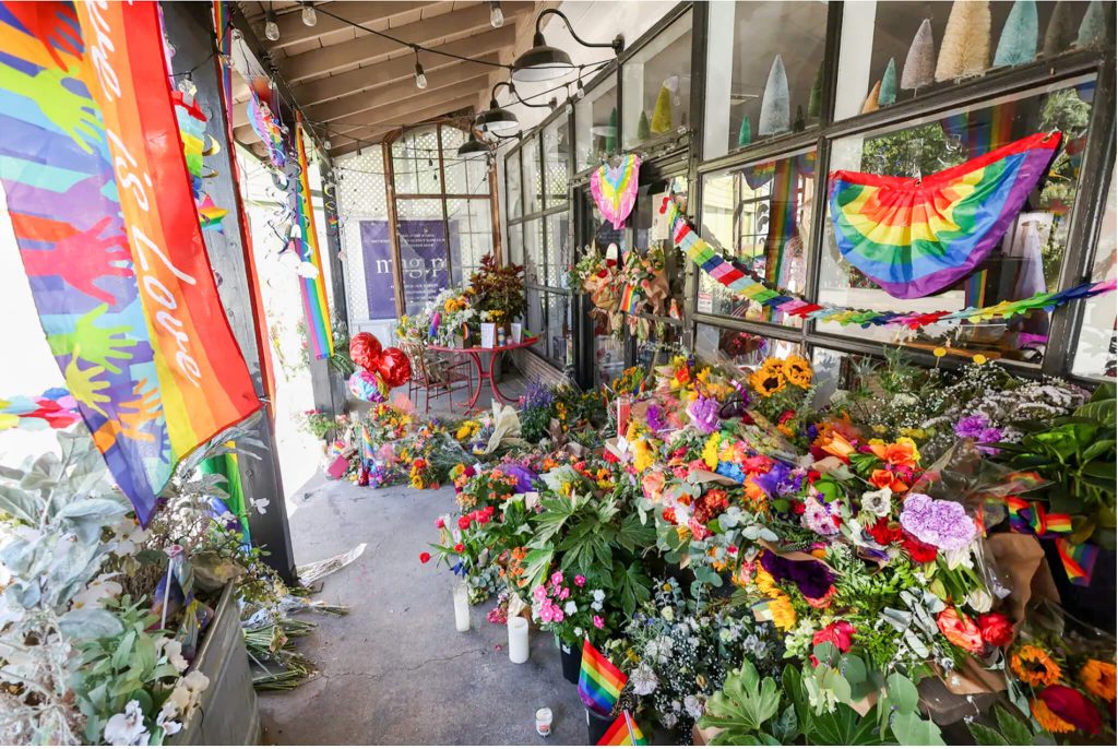 Fighting Hate. A makeshift memorial for store owner Laura Ann Carleton, 66, who was shot and killed following an argument about a pride flag hanging outside her business in Cedar Glen. August 24, 2023. 
Credit: Photo by Mario Anzuoni, Reuters
