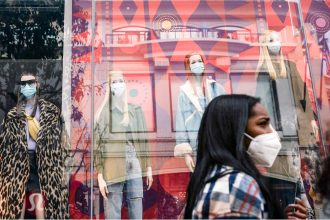 California COVID Cases. A shopper walks past mannequins donning face masks in Los Angeles in 2020. California's COVID-19 emergency declaration ended on Feb. 28, 2023, but there's been a recent uptick in cases across the state. Credit: Photo by Jae C. Hong, AP Photo
