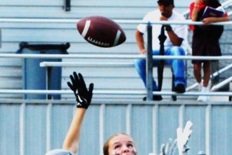 Featured Photos for the week of 9-15. Norco’s Jaylin Young eye’s a touchdown pass over a King defender. The Wolves edged the Cougars In the flag football contest, 25 – 24. Credit: Photo by Gary Evans