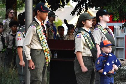 Anniversary of 9/11. Andre Chen and Connor Hoskins of Boy Scout Troop 251, Ever Ramos of Troop 2017G, and Domenic Seidita of Cub Pack 2017 (holding flag) stand at attention prior to raising the Colors during the City of Eastvale’s 9-11 Remembrance Ceremony last Monday. Credit: Photo by Gary Evans