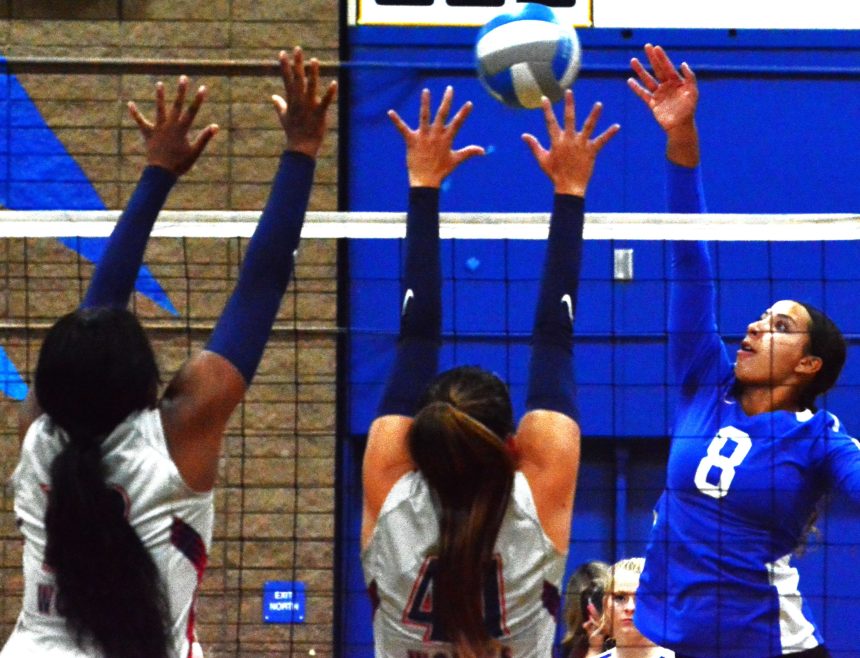 Riverside King’s Destiny Allen (18/left) and Summer Brayton (41/center) try to block Norco’s Demi Wagdy’s (8) shot during the Cougars 3 – 2 victory over the Wolves.