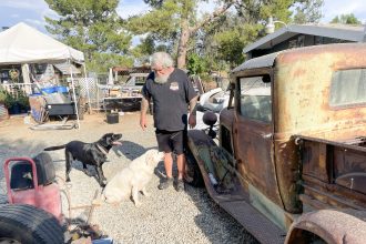 4 Paws 4 Patriots founder and CEO, Tim LeBlanc's current service dog, Buddy, is nearing retirement’ age. Diesel, left, is already trained and eager take over. Credit: Photo by Don Ray