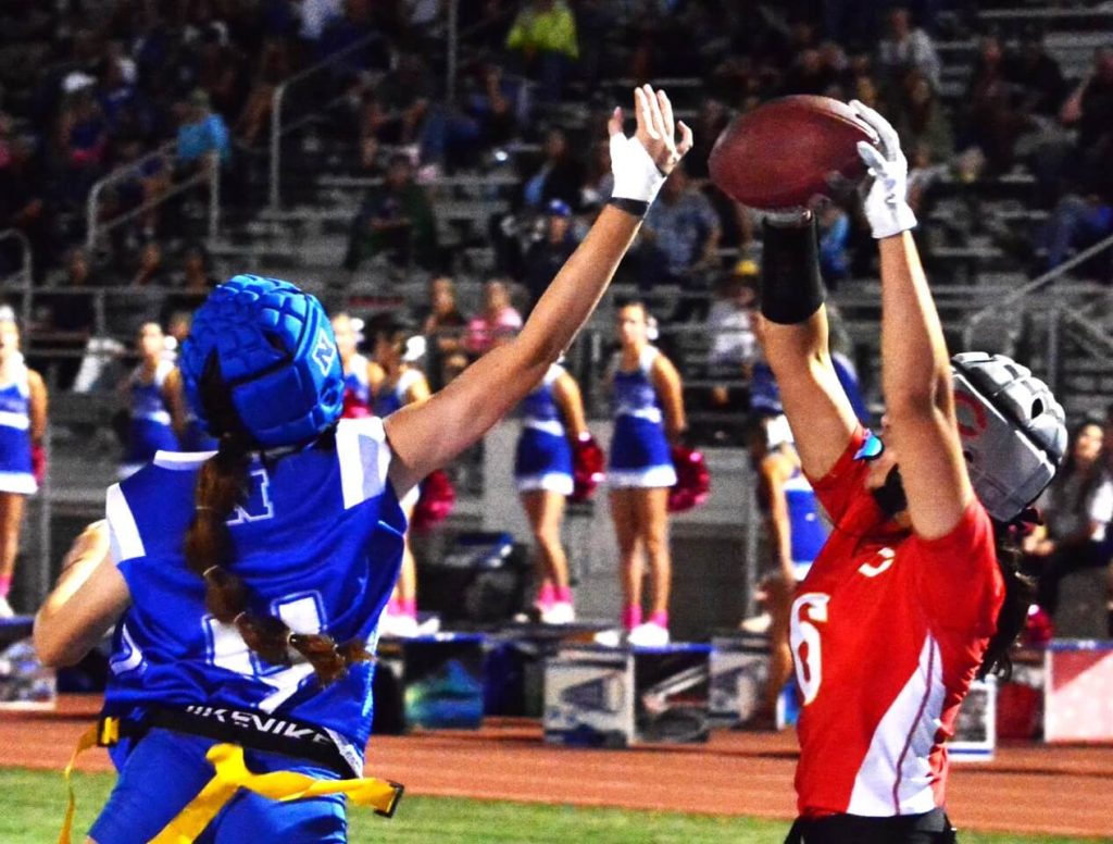 Corona High School Sports Photos and Last Week's Football Scoreboard 10-20-2023. Norco defender Cameron Wagner (4) just misses the ball as Corona’s Ava Liaga (6) catches a touchdown pass during the Panthers victory. Credit: Photo by Gary Evans