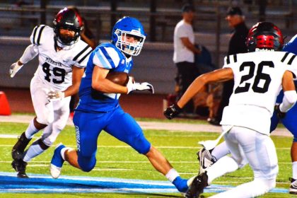 Corona High School Sports Photos and Football Scoreboard 10-13-2023. Norco running back Trevor Schneider (center) cuts back in front of Murrieta Valley’s Mehki Criss (26) with Joey Rodriguez (49) in pursuit. The Nighthawks defeated the Cougars 48 – 19. Photo By Gary Evans