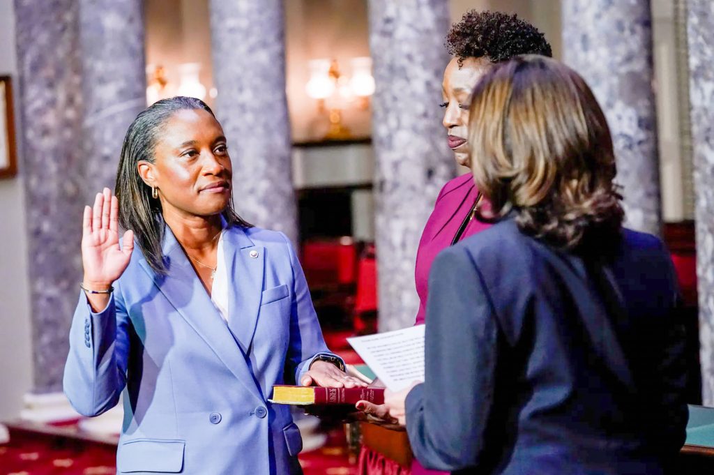 Vice President Kamala Harris swears in Laphonza Butler, left, to the U.S. Senate at the Capitol in Washington, D.C., on Tuesday. Credit: CalMatters Photo by Jack Gruber, USA Today
