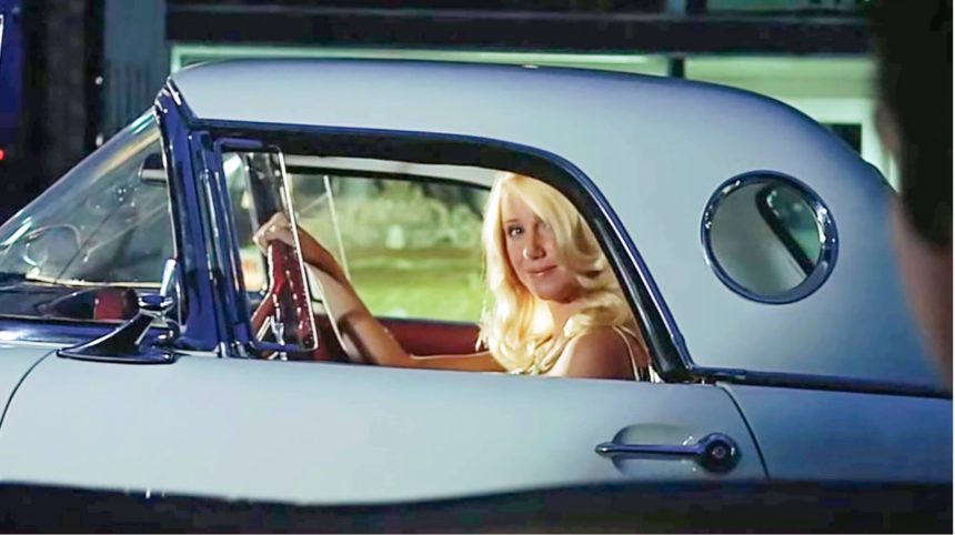 Playing the elusive blonde driving a Ford T-Bird, Suzanne Somers revealed that in casting her, fledgling director George Lucas only asked if she was able to drive? She had no speaking lines in the role she credited with changing her life forever. But she did mouth the words, “I love you,” to the obsessed teenage character played by Richard Dreyfuss. Credit: American Graffiti promotional photo