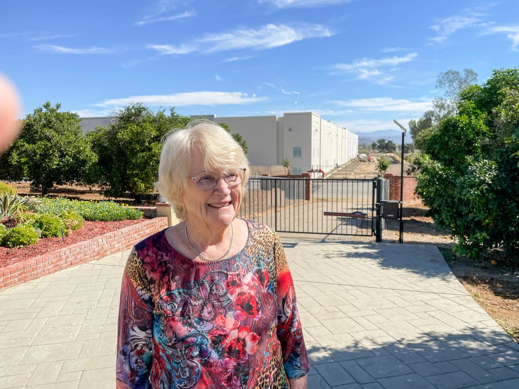 The view from the driveway of longtime Menifee resident Betty Bouris was once the wheat fields her husband farmed. Today, it's a light manufacturing complex under construction along the 215 Freeway corridor.    Credit: Photo by Don Ray