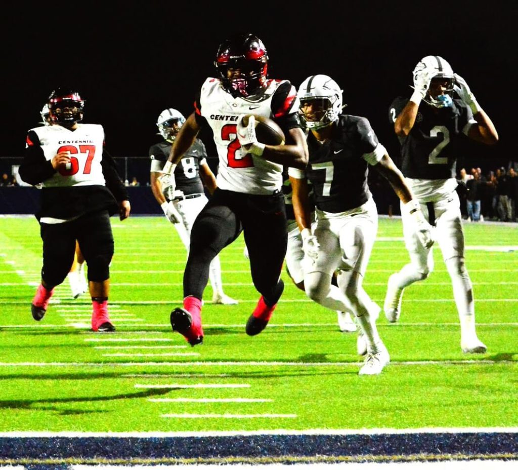 Bosco defensive back Tamal Johnson (#2 in black) appears stunned as Centennial running back Cornell Hatcher Jr. (#2 in white) is about to cross the goal line with an apparent 1st quarter touchdown. The disbelief quickly switched sides as the score was negated by a Huskie penalty.