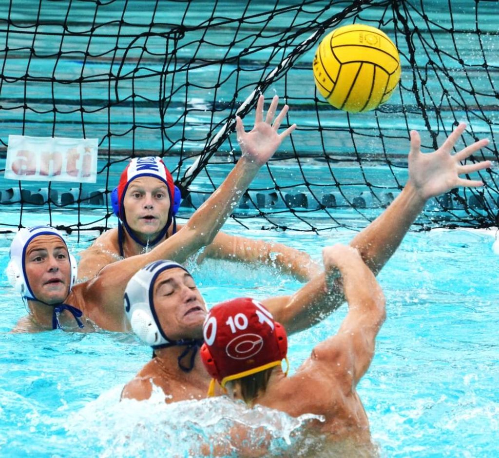 Corona’s Tyler Sckaggs (10) fires a shot while Norco goalie Adam Kirkpatrick (top) Tyler Dejongh (middle) and Scott Dejongh (bottom) defend. The Panthers defeated the Cougars 12 – 11 in a see-saw contest. League champ Eleanor Roosevelt defeated Redlands 6-4 in the opening round of the Division 3 playoffs. The Mustangs faced Anaheim Canyon on Thursday after press time. Santiago dropped its Division 2 opener to Capistrano Valley, 13-9 on Monday. Credit: Photo by Gary Evans