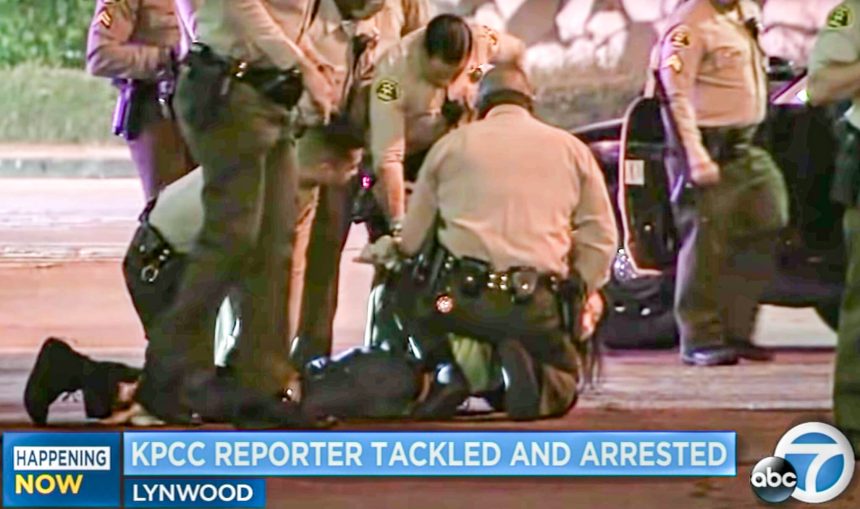 LA Sheriff Settlement. KPCC Reporter Josie Huang being held on the ground by LA County Sheriff’s deputies, as she’s being arrested while covering a protest in 2020. Credit: Screen Capture from KABC-TV