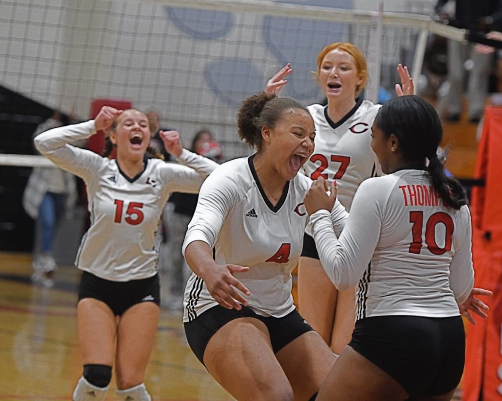 Centennial volleyball players Cydnee Bryant (4), Lailah Thompson (10), Londyn Neal (15) and Haidyn Achee (27) celebrate 3-0 win over visiting Irvine Northwood in CIF Div. 5 quarterfinals Oct. 26. The Huskies were eliminated in the Semi-Finals, as Temple City prevailed 3-0. Photo by Jerry Soifer