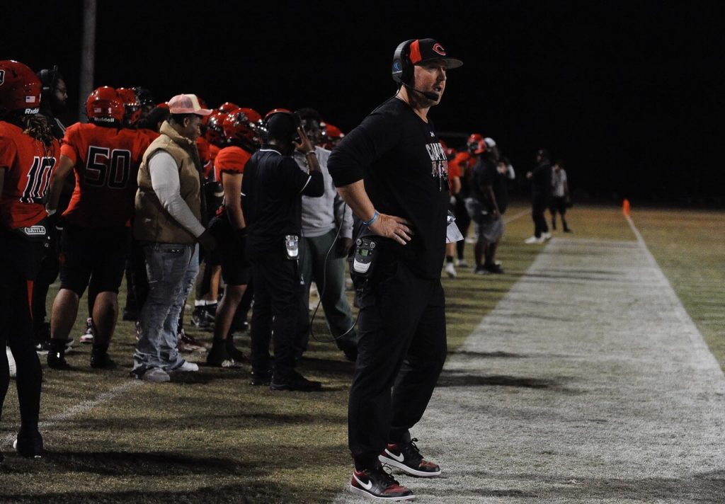 Corona High grad and NFL veteran Darrin Chiaverinni commands the sideline as the head coach of the Chaffey College  football team. 
Credit:  Photo by Jerry Soifer
