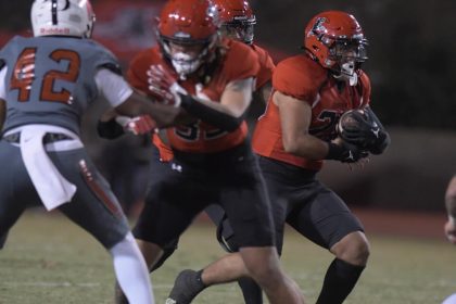 Centennial grad Jayson Cortez runs for some of the 100-plus yards he gained against visiting Santa Ana for Chaffey College Saturday. The Panthers captured the league title with the 34 – 24 win, moving up to #22 in the state poll. Credit: Photo by Jerry Soifer